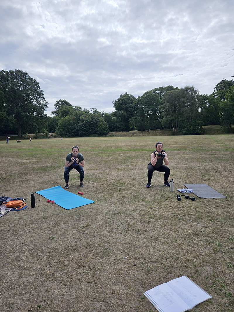 Mums exercising during an outdoor R.I.S.E class