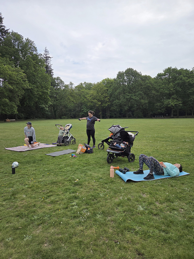 Mums taking part in an outdoor R.I.S.E fitness class